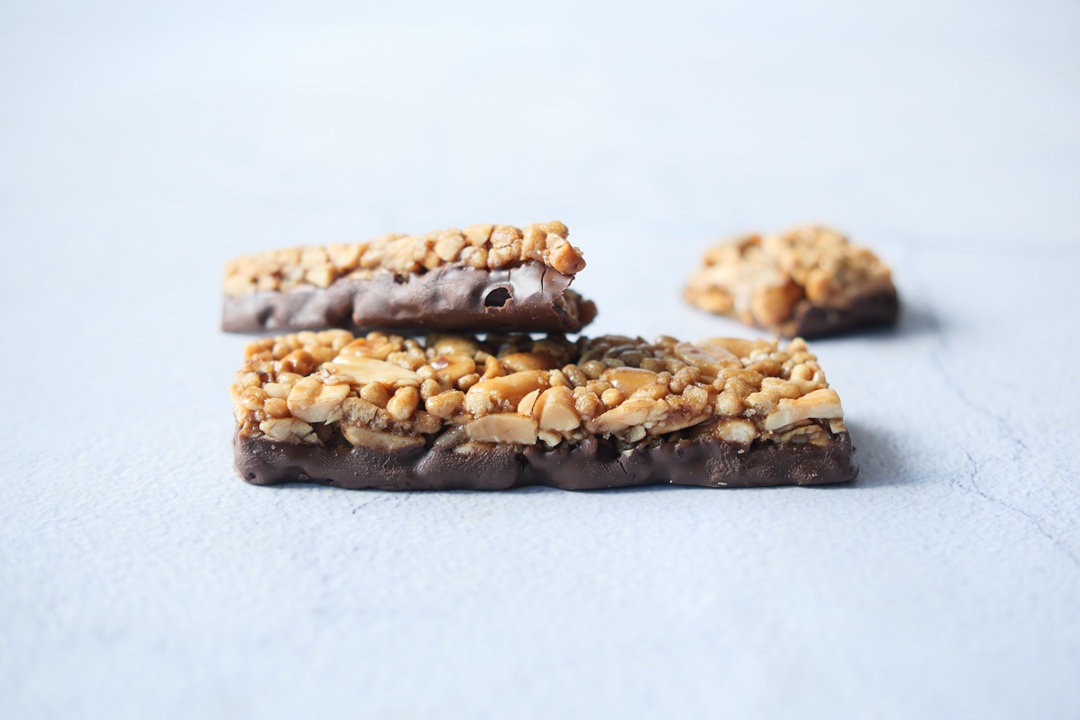 protein almond chocolate sweet bar on white protein almond chocolate sweet bar on white ,